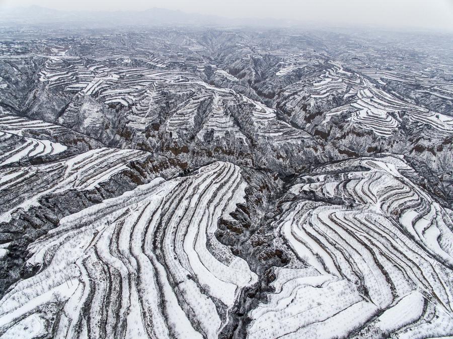 Scenery of snow-covered terrace fields in N China