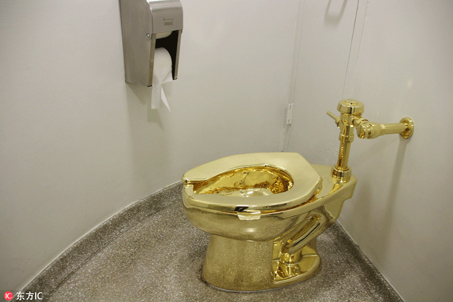 Gold toilet unveiled in New York