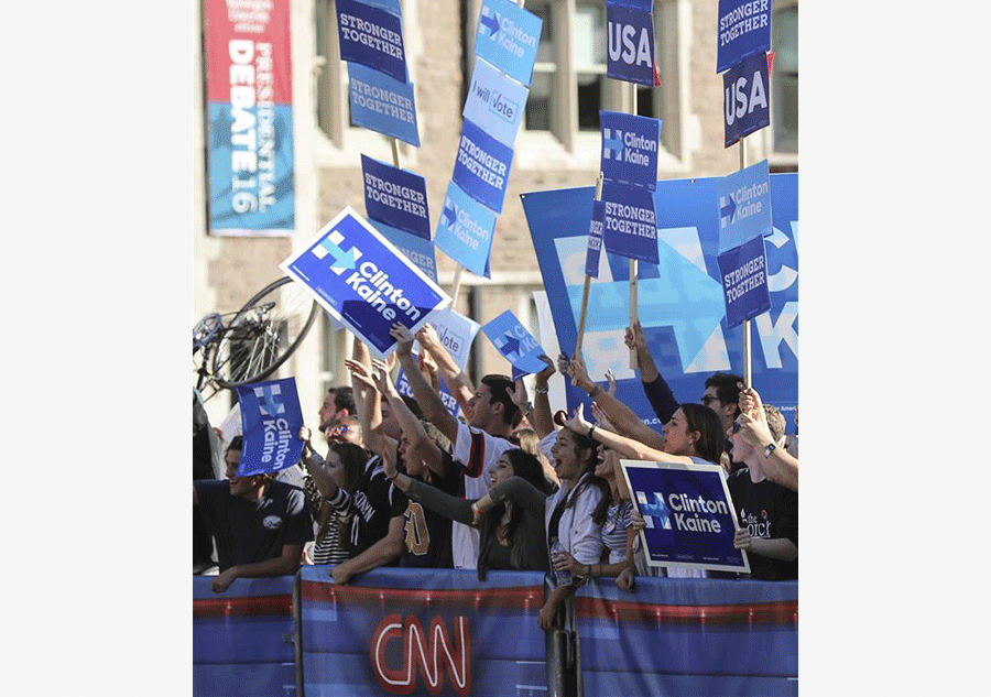 In shadow of vulgar tape, Trump, Clinton face off in high-stake second debate