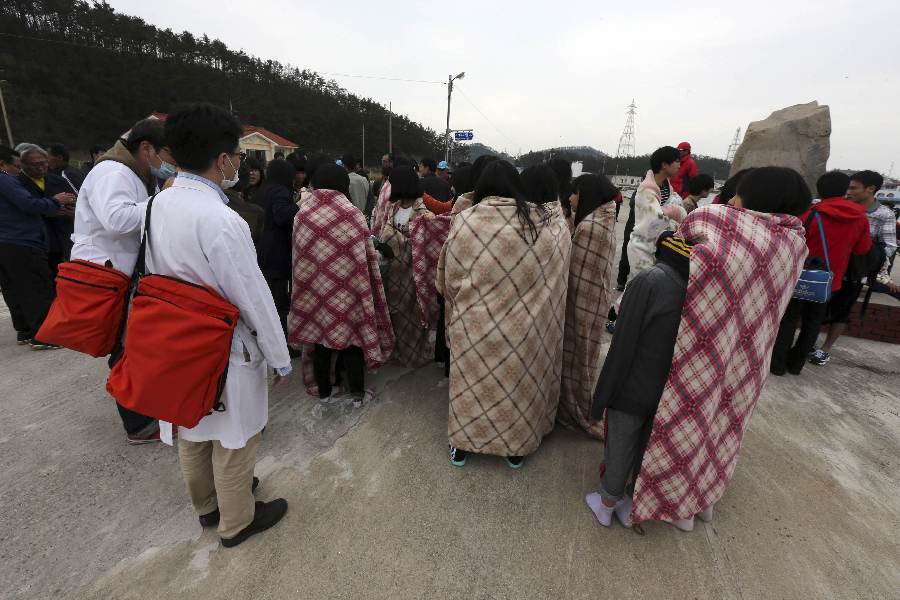 Passengers rescued by South Korean maritime policemen