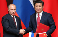 Putin says Russia-China ties enter new stage