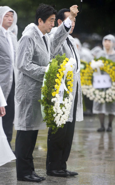 Hiroshima residents protest against Abe over collective defense