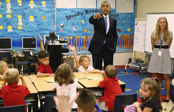 Obama entertains kids in elementary school visit