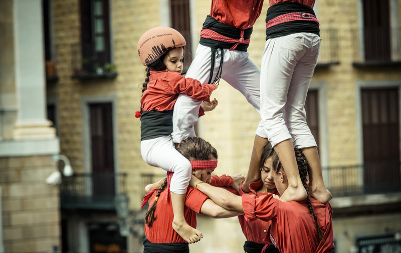 Castellers build human towers