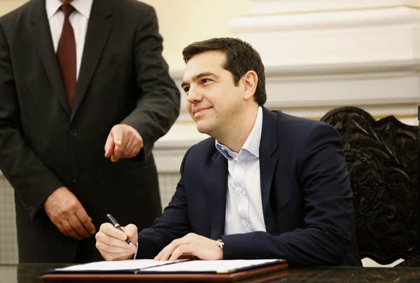 Greek leftist Tsipras sworn in as PM to fight bailout terms