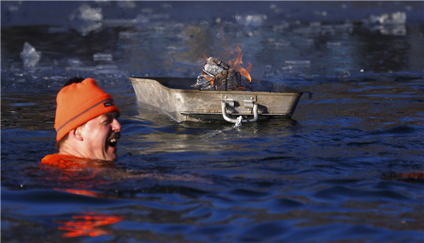 German ice swimming fans meet for annual carnival