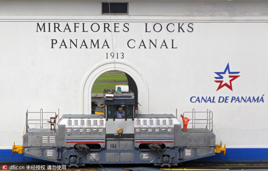 Expanded Panama Canal opens with Chinese ship making first passage