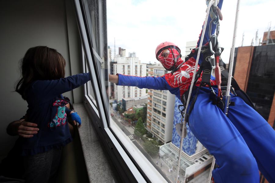 Superheroes cheer up sick children in Sao Paulo