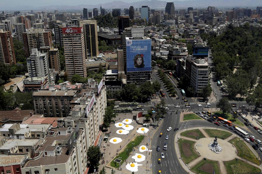 Streets are alive with giant fried eggs in Santiago