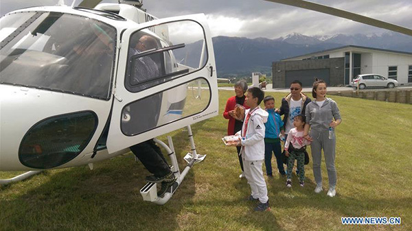 Six Chinese tourists airlifted out of quake-hit town