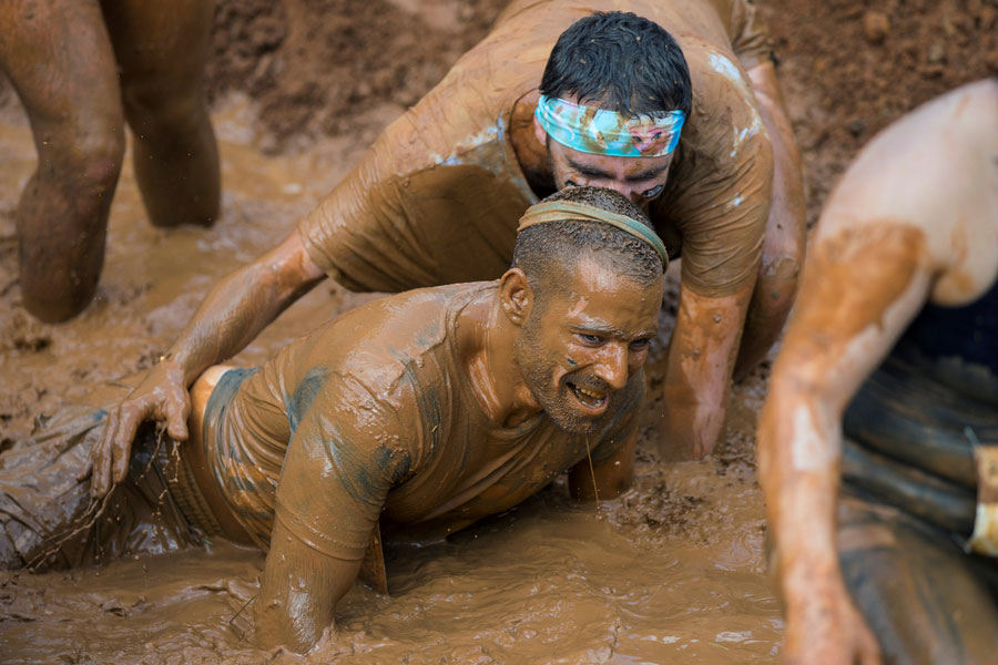 Israelis battle through miles of obstacles for 'Mud Day'