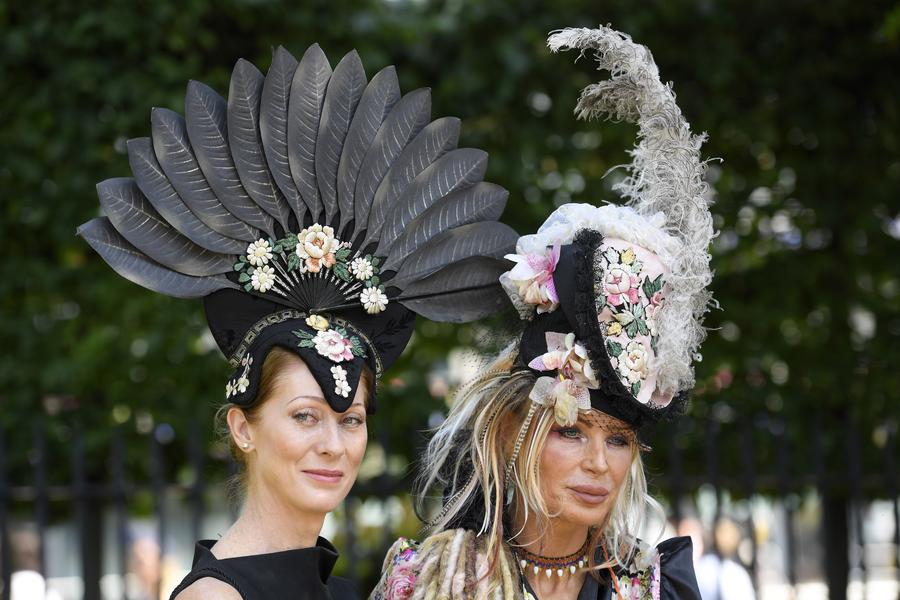 Despite high temps, Royal Ascot-goers don finest outfits